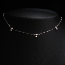 silver necklace with pearls and cubic zirconia stones