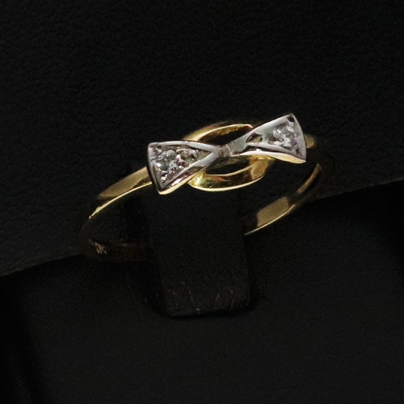 gold bow ring with cubic zirconia stones