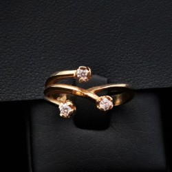 gold ring with three cubic zirconia stones 2