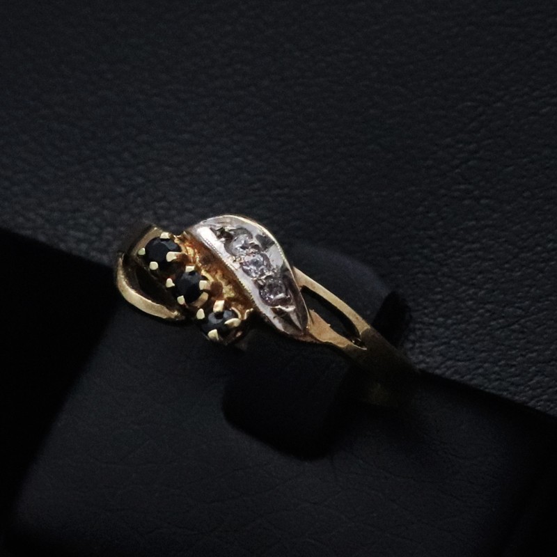 gold ring with black onyx stones and cubic...