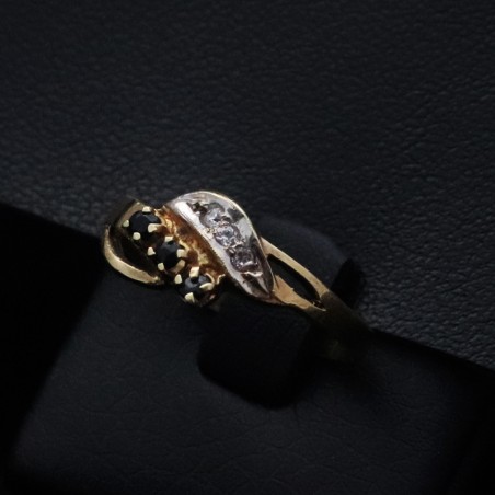 gold ring with black onyx stones and cubic zirconia stones