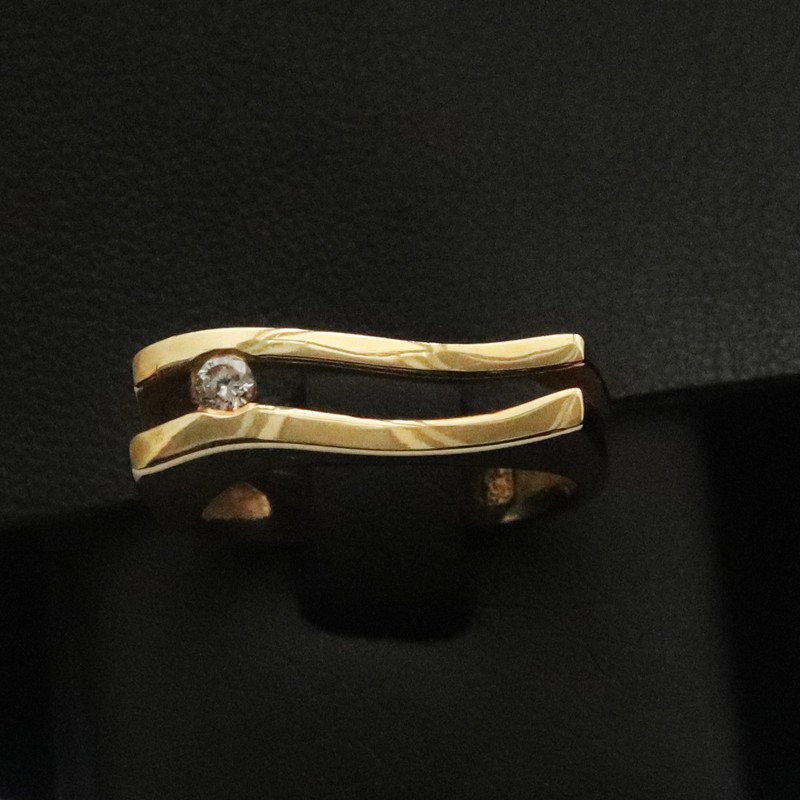 double gold ring with cubic zirconia stone