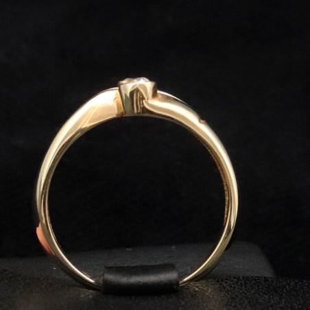 gold ring with two cubic zirconia stones