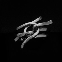 white gold ring with patterns