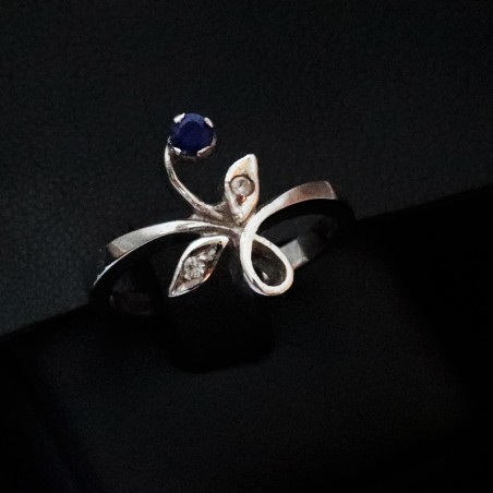 white gold ring with cubic zirconia and sapphire stones