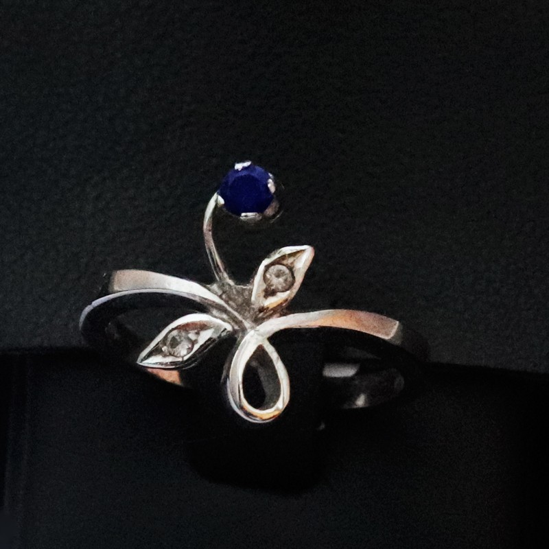 white gold ring with cubic zirconia and sapphire stones