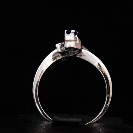 white gold ring with cubic zirconia and sapphire stones