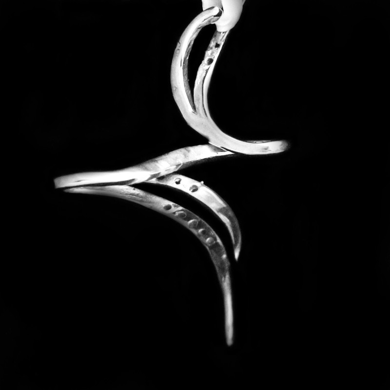 cross with curves and cubic zirconia stones