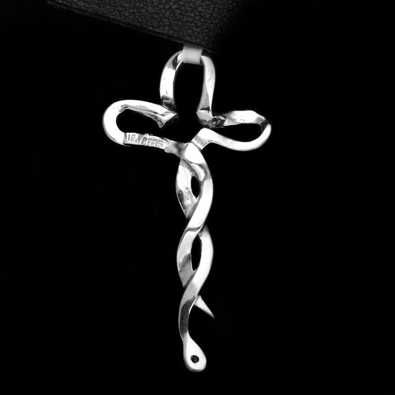 cross with curves and cubic zirconia stones