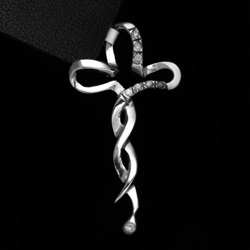 cross with curves and cubic zirconia stones