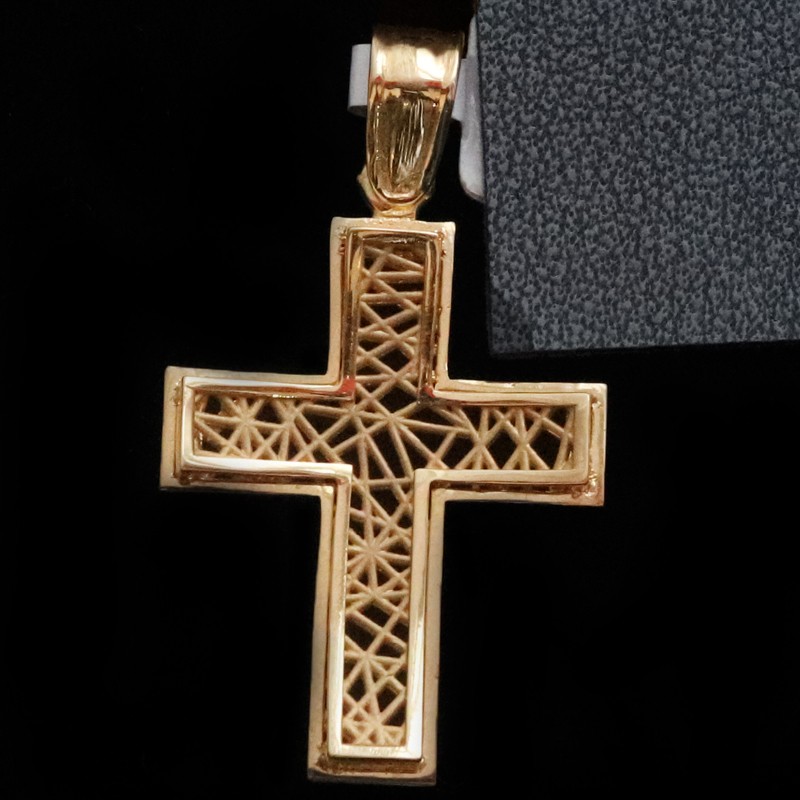 golden cross with pattern in the center