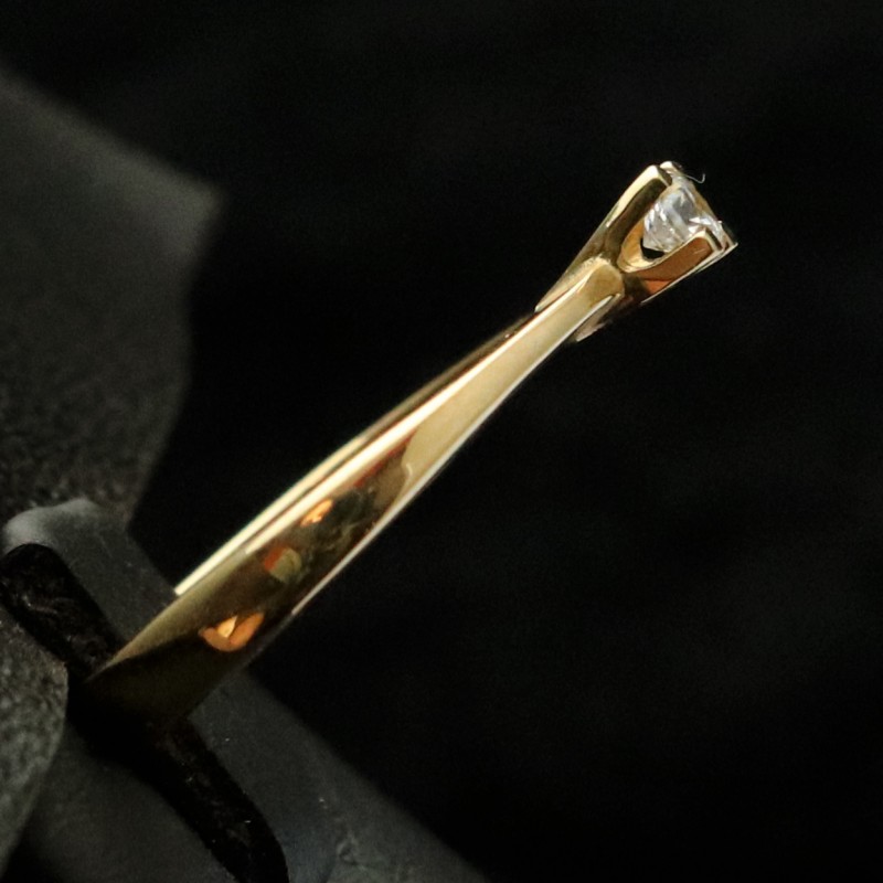 golden wedding ring with cubic zirconia