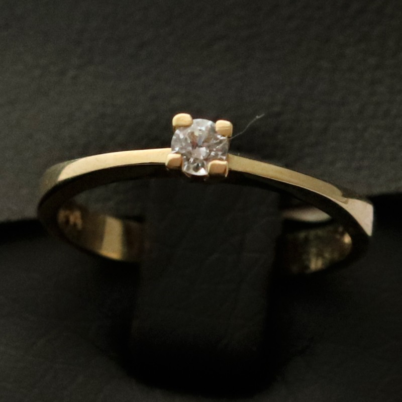 golden wedding ring with cubic zirconia