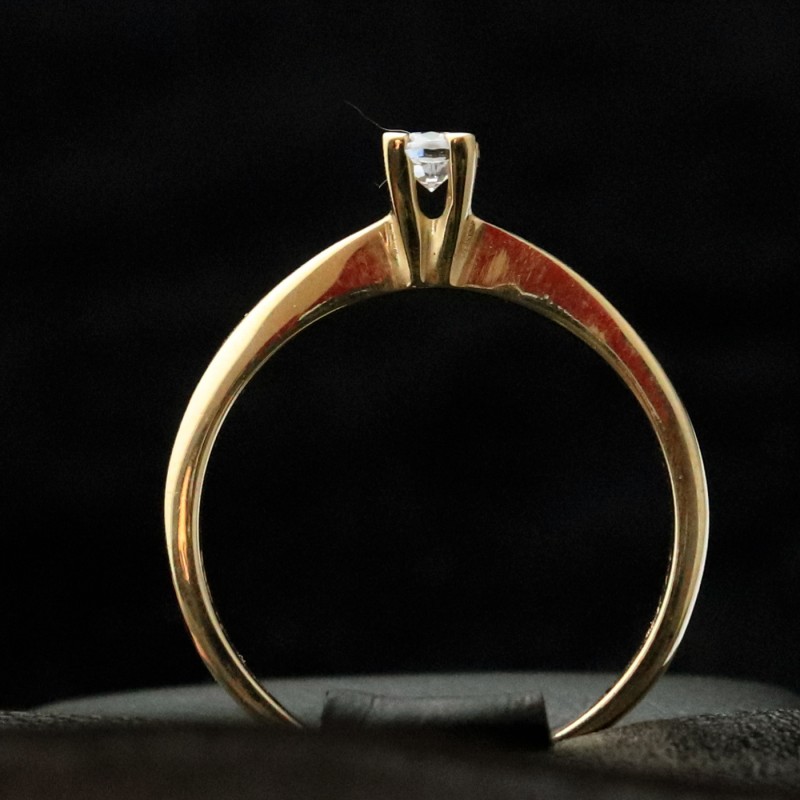 golden wedding ring with cubic zirconia