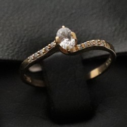 golden women ring with cubic zirconia