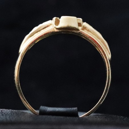 woman yellow gold ring with cubic zirconia