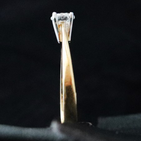 white and yellow gold ring with cubic zirconia