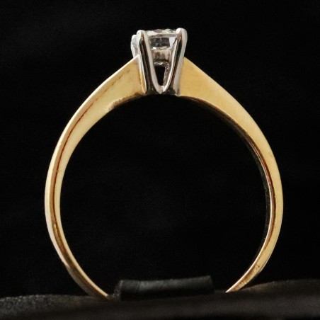 white and yellow gold ring with cubic zirconia