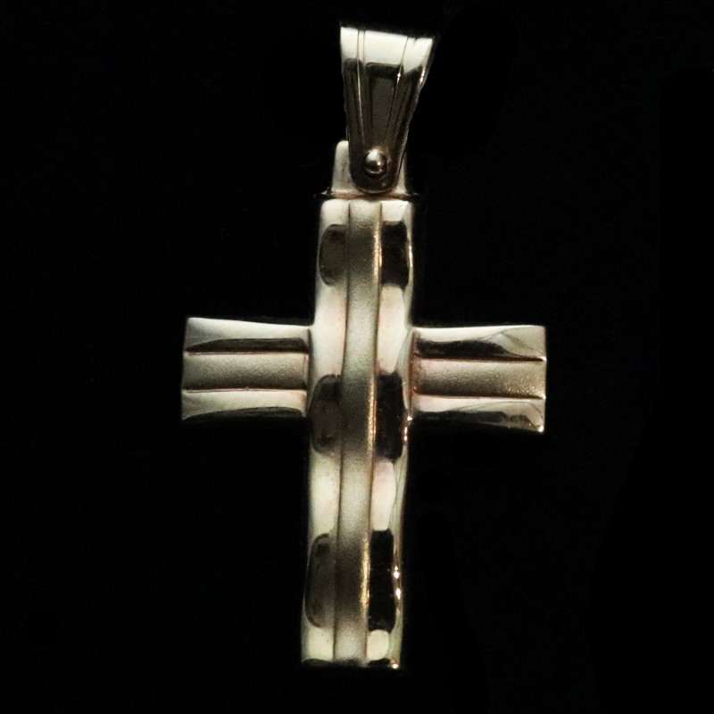 gold cross with curves
