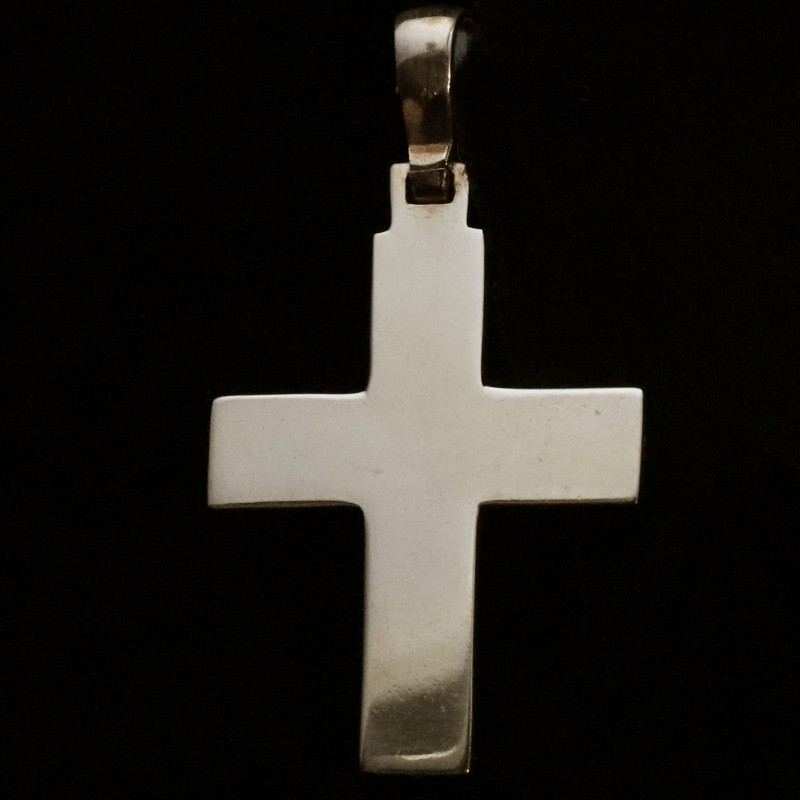 golden bicolor cross with oval patterns