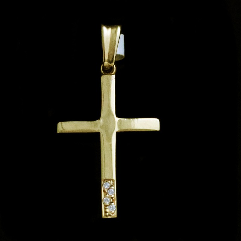 gold cross with cubic zirconia stones at the bottom