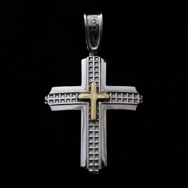 white gold cross with yellow detail in the center