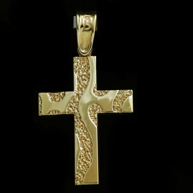 gold forged cross with patterns