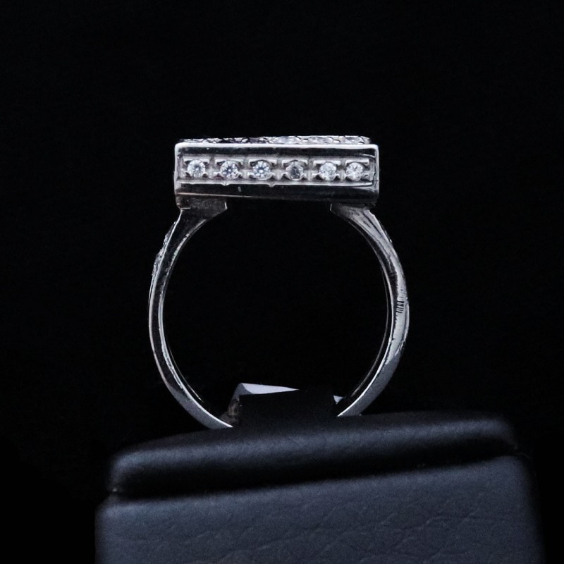 white gold ring with cubic zirconia