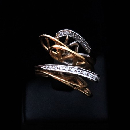 asymmetric gold ring with zircon stones