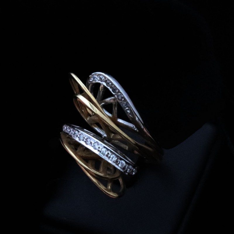 asymmetric gold ring with zircon stones