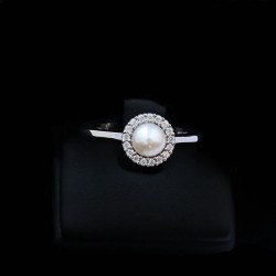 white gold ring with pearl and cubic zirconia