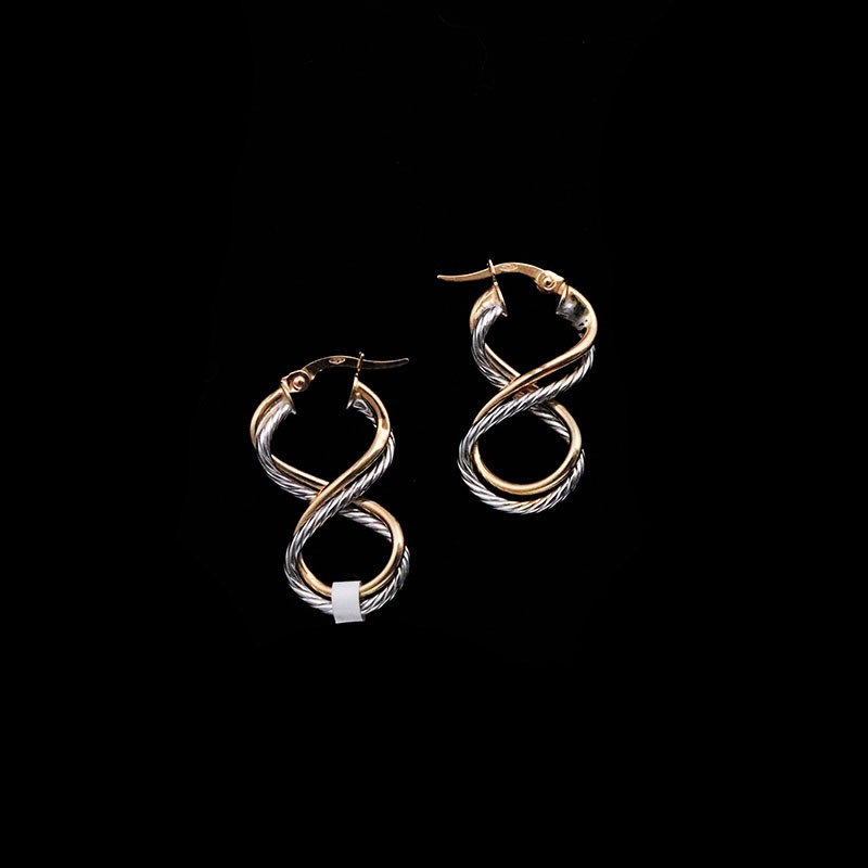 gold earrings with curves