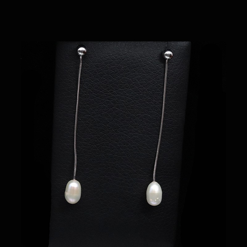 white gold dangling earrings with pearl