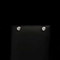 White gold earrings with zircon stones