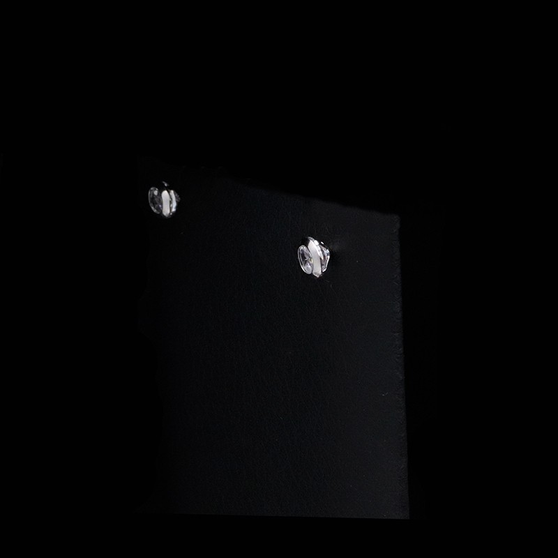 White gold earrings with zircon stones