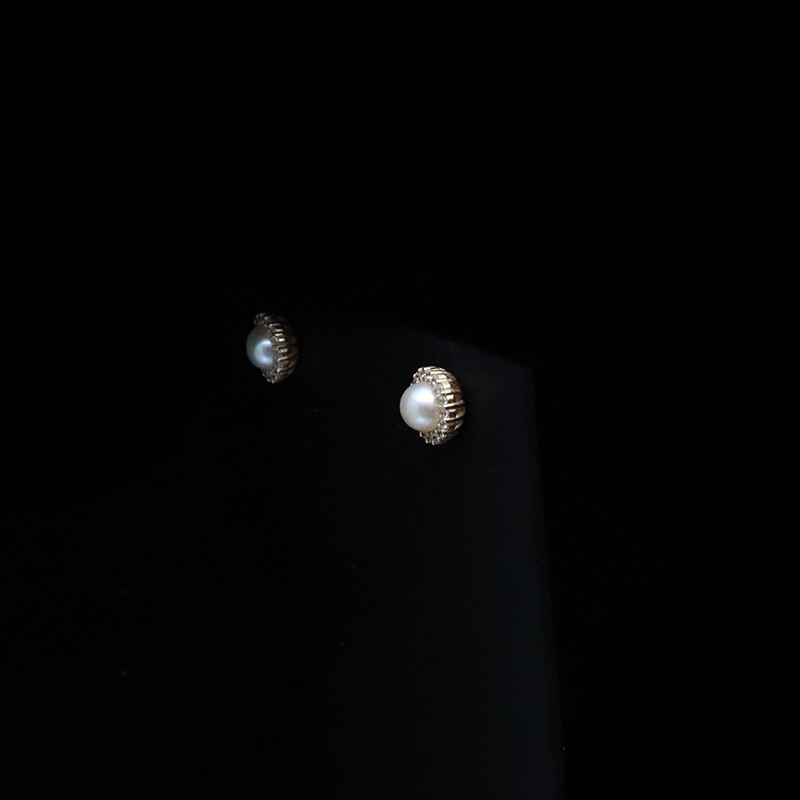 white gold earrings with zircon stones