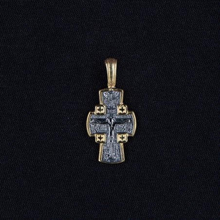 breasted gilded cross