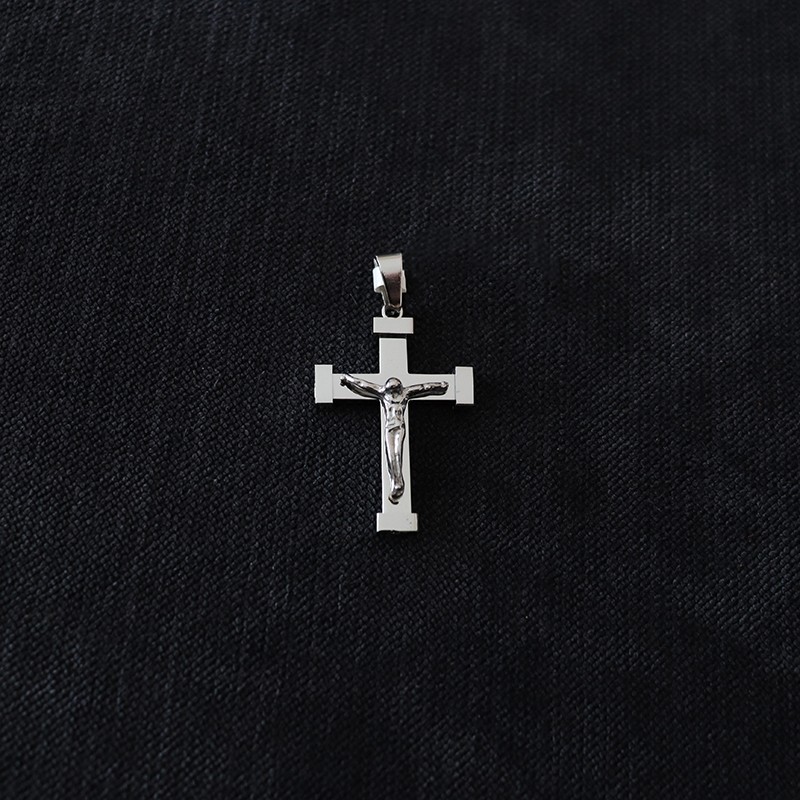 steel cross with Jesus Christ