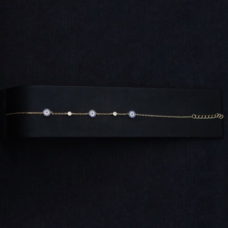 gold bracelet with blue zircon