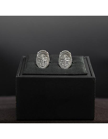 silver cufflinks with the Crucified