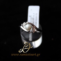 white gold ring with pearl and cubic zirconia