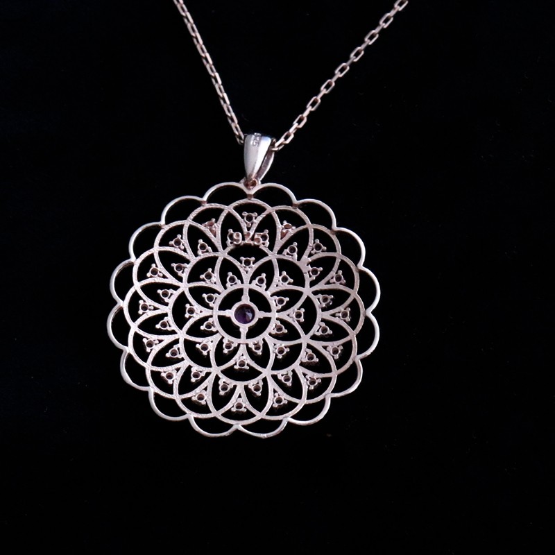 silver necklace with pink cubic zirconia stones