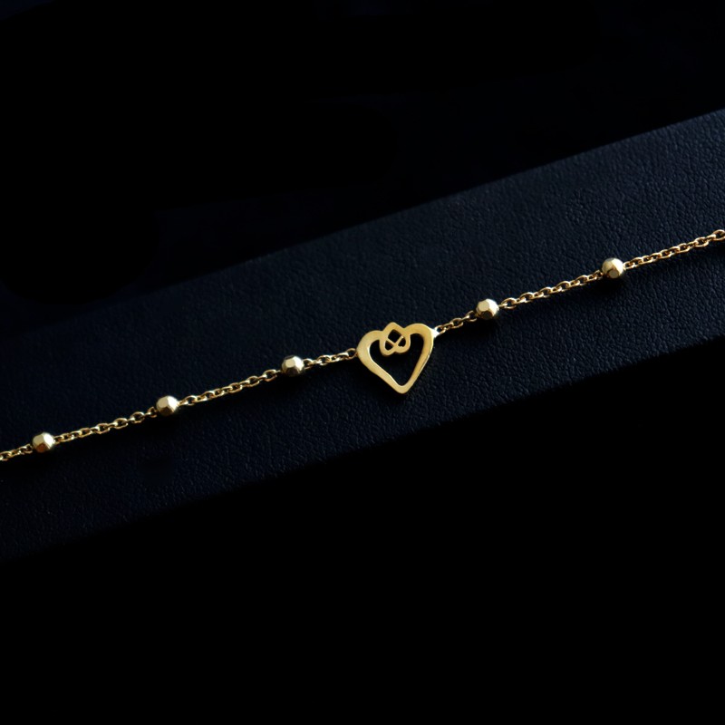 gold plated bracelet with stones and mini heart