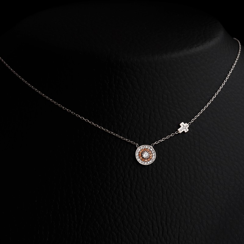 silver eye necklace with cross