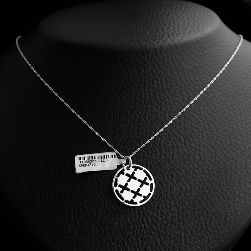silver circle necklace with patterns