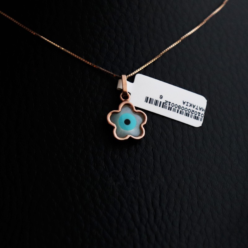 daisy shaped necklace with pink gilded eye