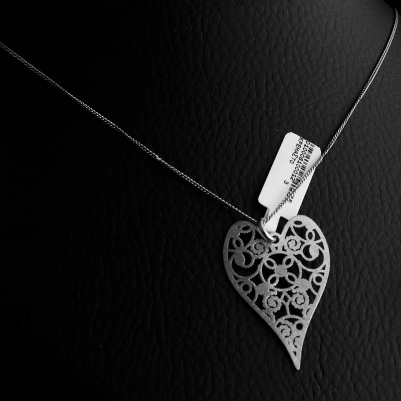 silver heart necklace with patterns