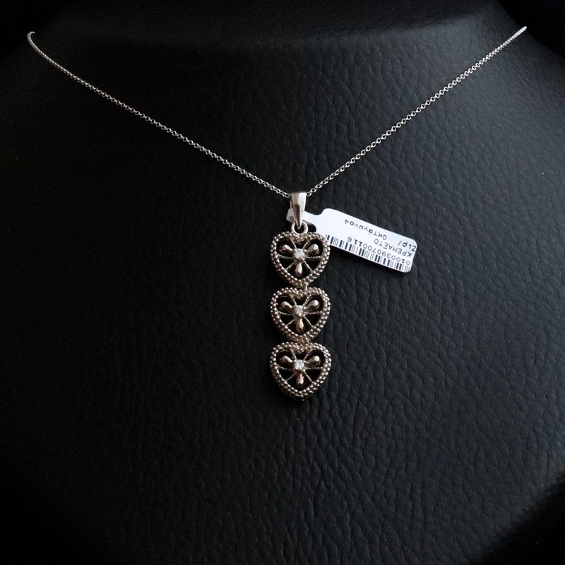 silver necklace with three hearts