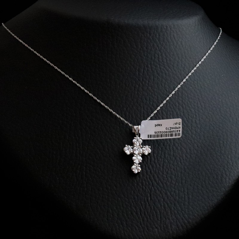 silver necklace with six cubic zirconia stones