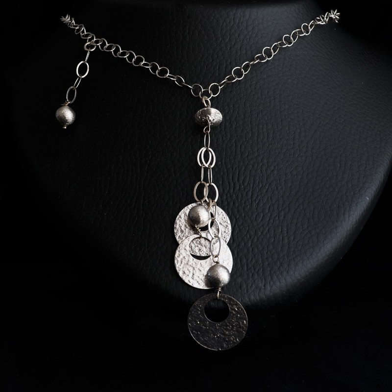 silver necklace with hanging rings